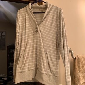 Fan and white sweater